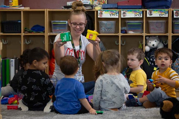 daycare teacher with children